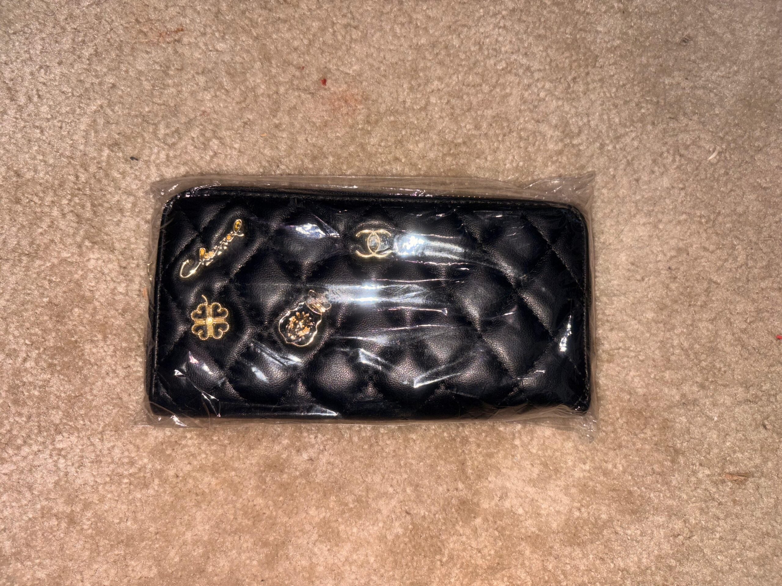 Chanel Black Zippy Lucky Charms Quilted Long Wallet