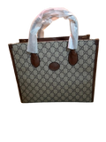 Gucci’s signature GG Supreme canvas - Small Tote Bag