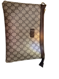 Gucci’s signature GG Supreme canvas - GG Supreme Pouch