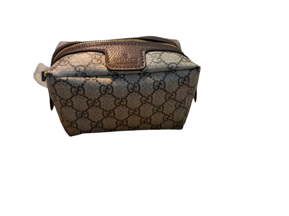 Gucci’s signature GG Supreme canvas - Cosmetic Case