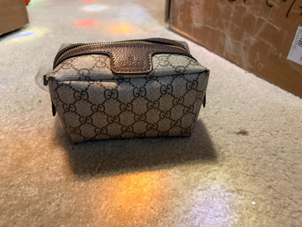 Gucci’s signature GG Supreme canvas
