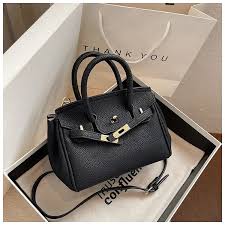Mini Kelly-style handbags