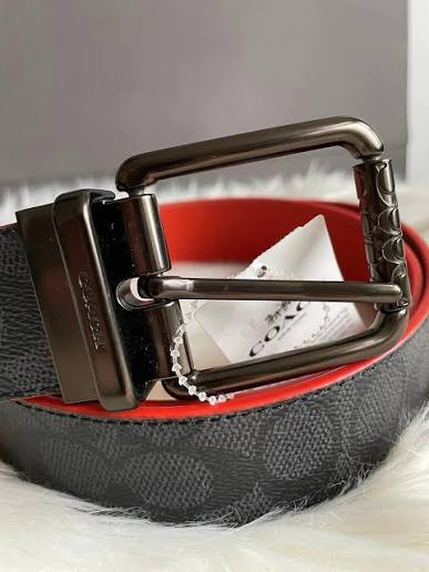 Coach belt and a bi-fold wallet