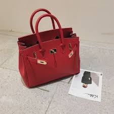 Mini Kelly-style handbags