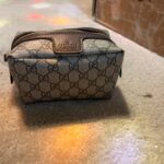 Gucci’s signature GG Supreme canvas